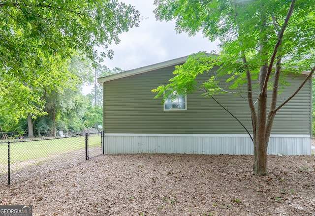 3251 Harrell Rd, Whigham, GA 39897 - view of property exterior with a gate