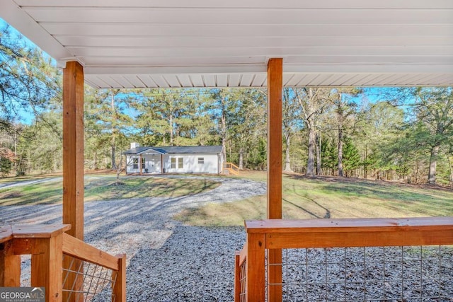 580 Vaughn Rd, Griffin, GA 30223 - view of grassy yard featuring view of wooded area and an outdoor structure