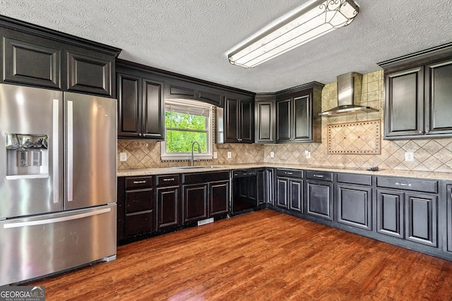 68 Riveree Rd, Brooks, GA 30205 - kitchen featuring stainless steel refrigerator with ice dispenser, wall chimney exhaust hood, dishwasher, dark wood finished floors, and a textured ceiling