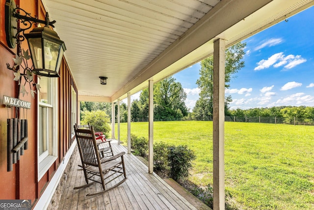 68 Riveree Rd, Brooks, GA 30205 - porch with a lawn and view of wooded area