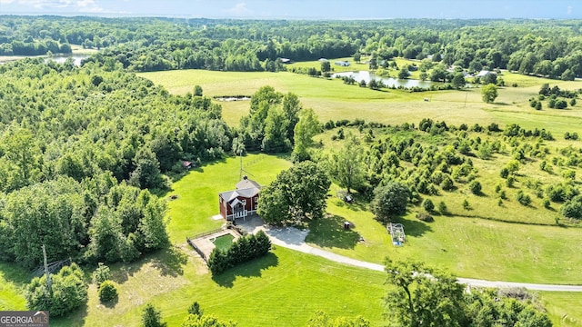 68 Riveree Rd, Brooks, GA 30205 - view of rural area featuring a large body of water and a heavily wooded area