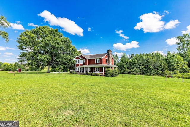 68 Riveree Rd, Brooks, GA 30205 - rear view of property featuring a chimney and a porch