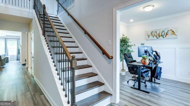 3410 Summerpoint Xing, Cumming, GA 30028 - stairs featuring wood finished floors, crown molding, and baseboards