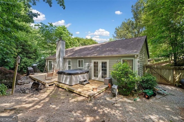 10650 Colony Glen Dr, Johns Creek, GA 30022 - back of house with french doors, a deck, a chimney, and a shingled roof
