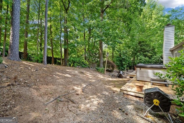 10650 Colony Glen Dr, Johns Creek, GA 30022 - view of yard featuring a hot tub and a wooden deck