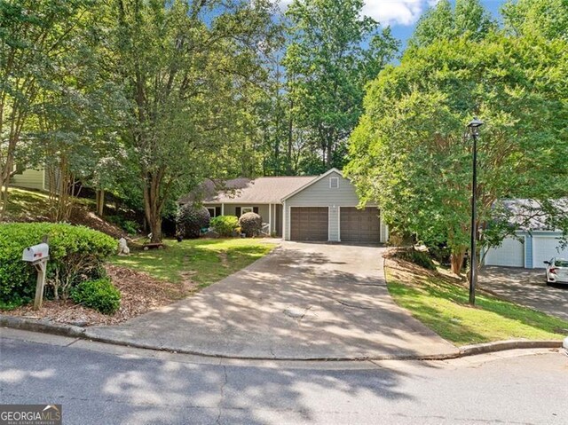 10650 Colony Glen Dr, Johns Creek, GA 30022 - view of front of house featuring a garage, concrete driveway, and a front yard