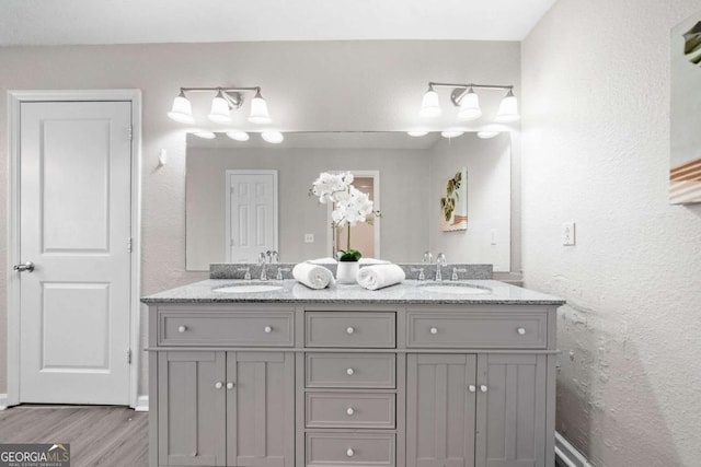 705 Beaufort Cir, Duluth, GA 30096 - full bathroom with wood finished floors and double vanity