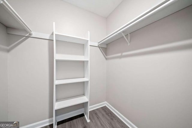 705 Beaufort Cir, Duluth, GA 30096 - spacious closet with wood finished floors