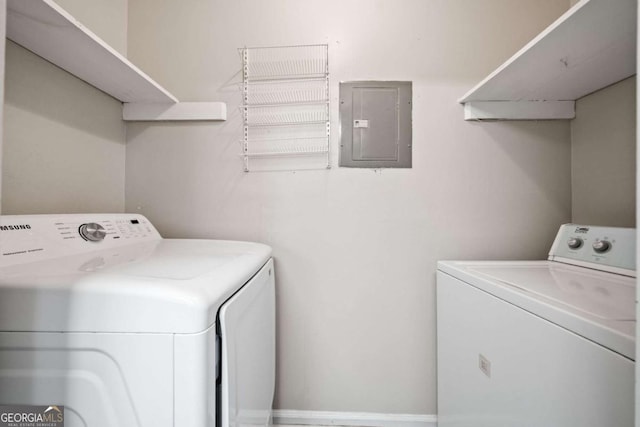705 Beaufort Cir, Duluth, GA 30096 - laundry area featuring electric panel and washing machine and clothes dryer