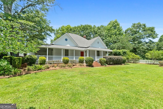 441 Crumbley Rd, Mcdonough, GA 30252 - country-style home with a shingled roof, a porch, and a chimney