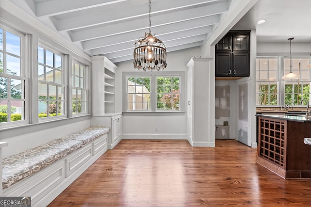 441 Crumbley Rd, Mcdonough, GA 30252 - unfurnished dining area with a chandelier, wood finished floors, healthy amount of natural light, and recessed lighting