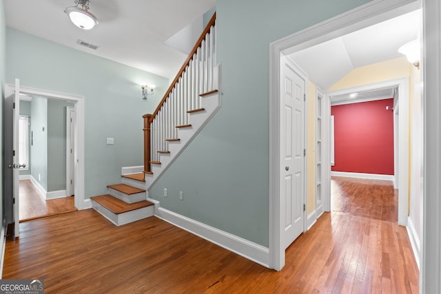 441 Crumbley Rd, Mcdonough, GA 30252 - staircase featuring wood-type flooring and baseboards