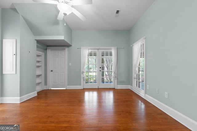 441 Crumbley Rd, Mcdonough, GA 30252 - empty room featuring french doors, wood finished floors, baseboards, and a ceiling fan