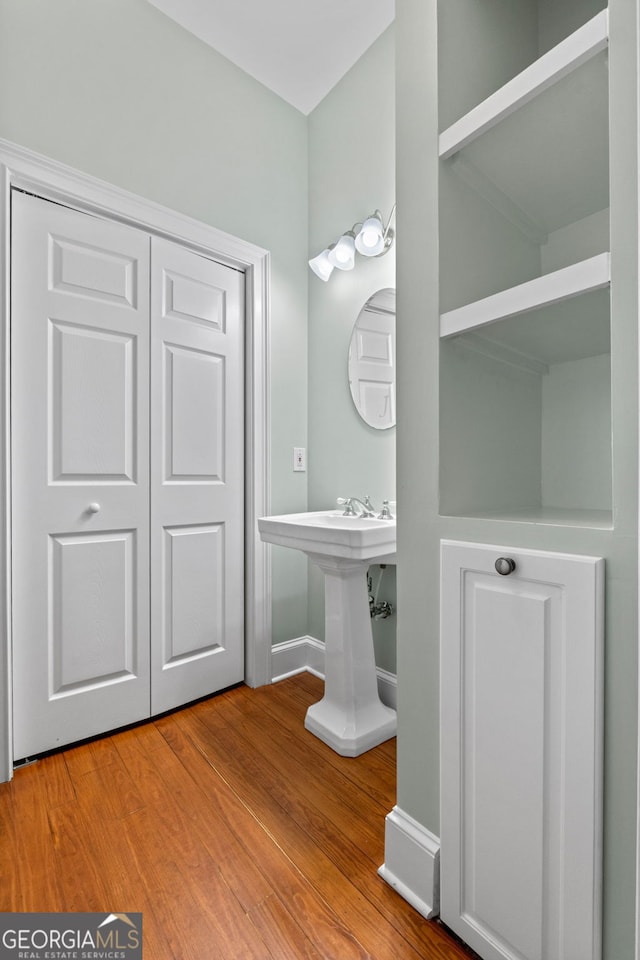 441 Crumbley Rd, Mcdonough, GA 30252 - bathroom with wood finished floors and baseboards