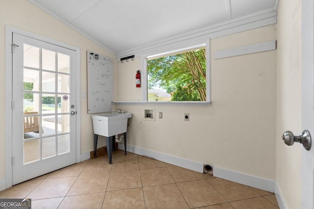 441 Crumbley Rd, Mcdonough, GA 30252 - washroom with electric dryer hookup, washer hookup, crown molding, light tile patterned flooring, and baseboards