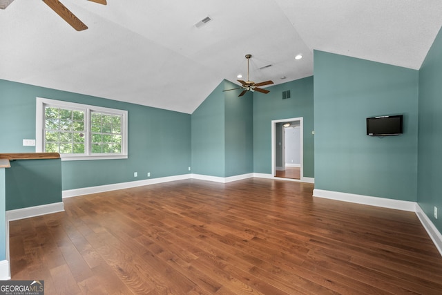441 Crumbley Rd, Mcdonough, GA 30252 - unfurnished living room featuring ceiling fan, hardwood / wood-style flooring, baseboards, and high vaulted ceiling
