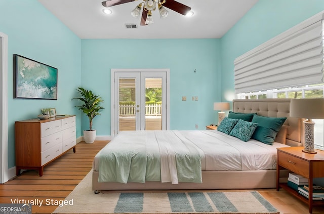 441 Crumbley Rd, Mcdonough, GA 30252 - bedroom featuring access to exterior, wood finished floors, a ceiling fan, and baseboards