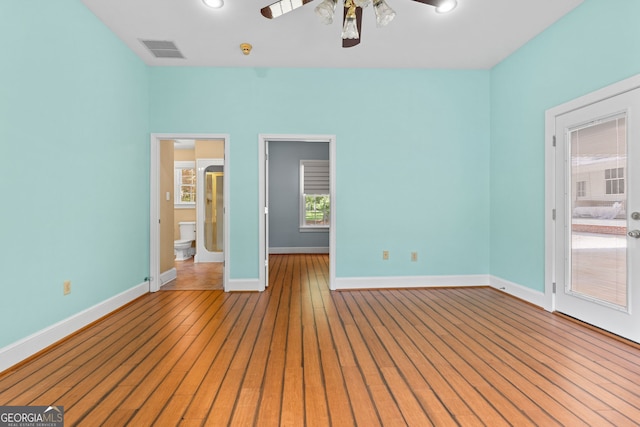 441 Crumbley Rd, Mcdonough, GA 30252 - unfurnished bedroom featuring baseboards, wood finished floors, and a ceiling fan
