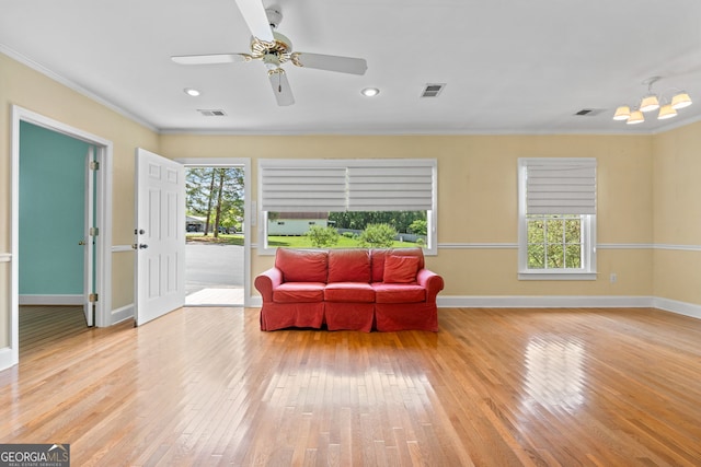441 Crumbley Rd, Mcdonough, GA 30252 - sitting room with light wood finished floors, ornamental molding, baseboards, ceiling fan, and recessed lighting