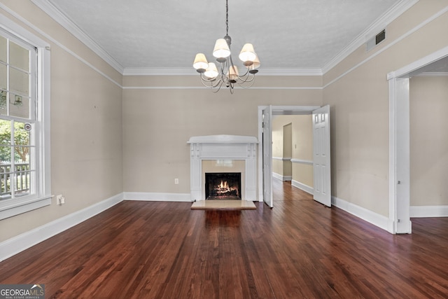 441 Crumbley Rd, Mcdonough, GA 30252 - unfurnished living room with a warm lit fireplace, a chandelier, crown molding, wood finished floors, and baseboards