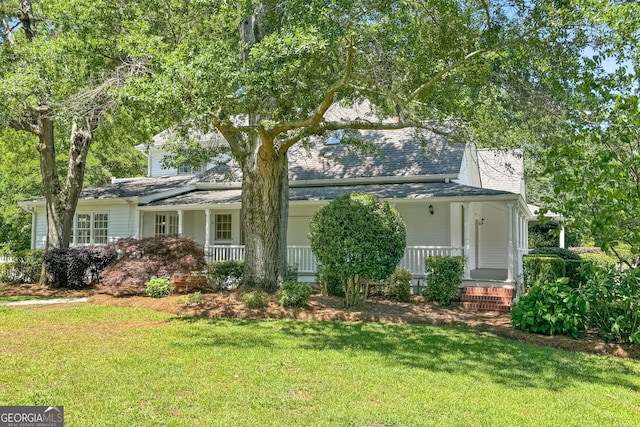 441 Crumbley Rd, Mcdonough, GA 30252 - view of front of house with a porch and a front lawn