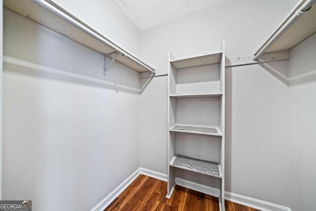 717 Beaufort Cir, Duluth, GA 30096 - spacious closet featuring wood finished floors