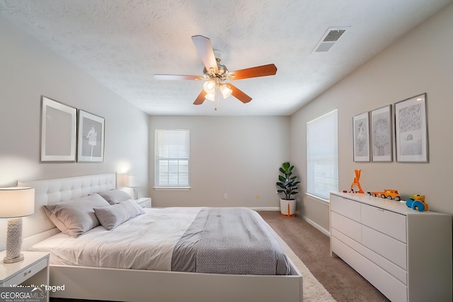 6509 Charter Way, Lithonia, GA 30058 - bedroom with light colored carpet, multiple windows, and a ceiling fan