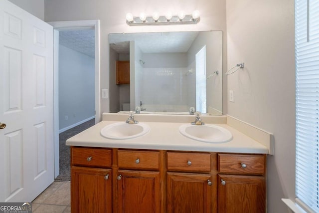 6509 Charter Way, Lithonia, GA 30058 - full bath featuring double vanity, bathing tub / shower combination, and tile patterned flooring