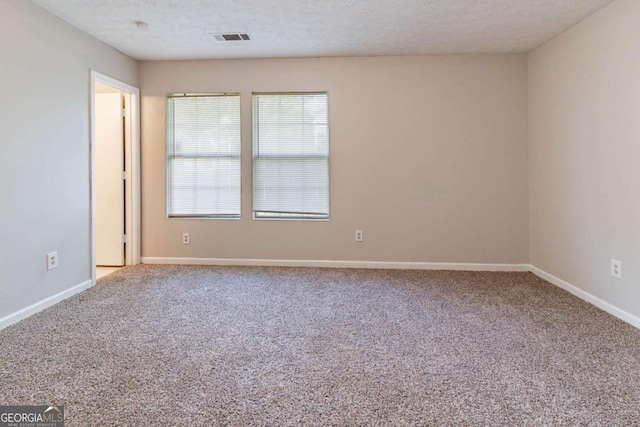 5614 Regency Forest Ct, Lithonia, GA 30038 - unfurnished room featuring carpet flooring, baseboards, and a textured ceiling