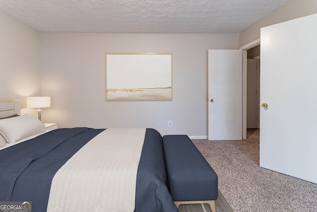 5614 Regency Forest Ct, Lithonia, GA 30038 - carpeted bedroom with a textured ceiling