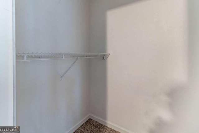 5614 Regency Forest Ct, Lithonia, GA 30038 - walk in closet featuring carpet flooring