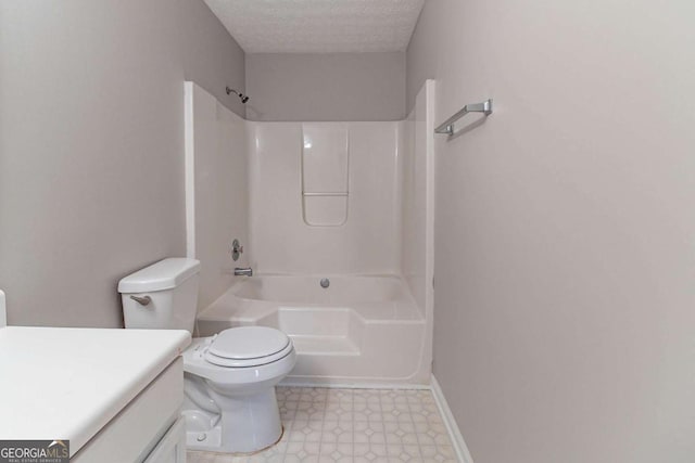 5614 Regency Forest Ct, Lithonia, GA 30038 - full bath with vanity, tile patterned floors, shower / washtub combination, toilet, and a textured ceiling