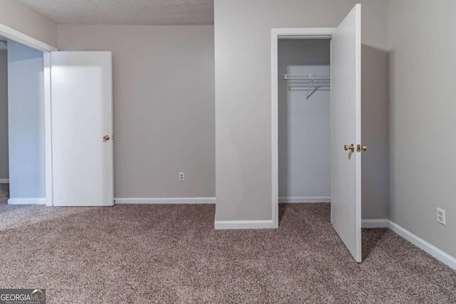 5614 Regency Forest Ct, Lithonia, GA 30038 - unfurnished bedroom featuring carpet floors and a closet