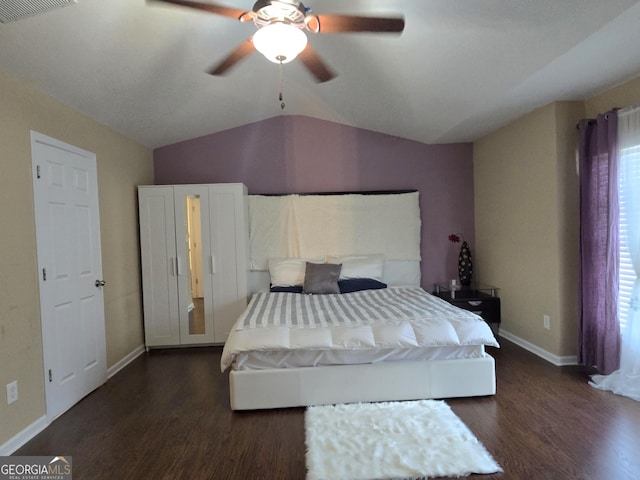 4860 Berkeley Glen Dr, Peachtree Corners, GA 30092 - bedroom with wood finished floors, lofted ceiling, baseboards, and a ceiling fan