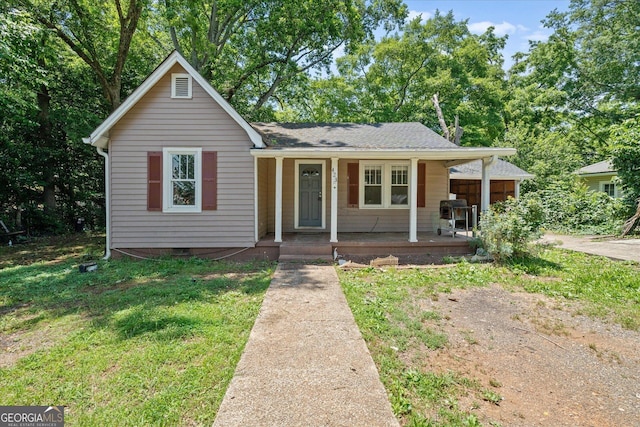 423 Clifton Ter, Carrollton, GA 30117 - view of front of property featuring a porch and a front yard