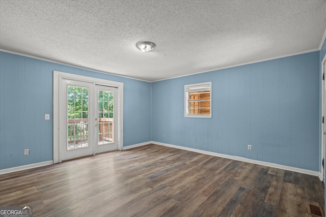 423 Clifton Ter, Carrollton, GA 30117 - unfurnished room featuring wood finished floors, a textured ceiling, and baseboards