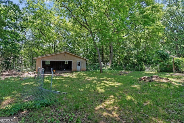 423 Clifton Ter, Carrollton, GA 30117 - view of yard with an outbuilding, a pole building, and a garage