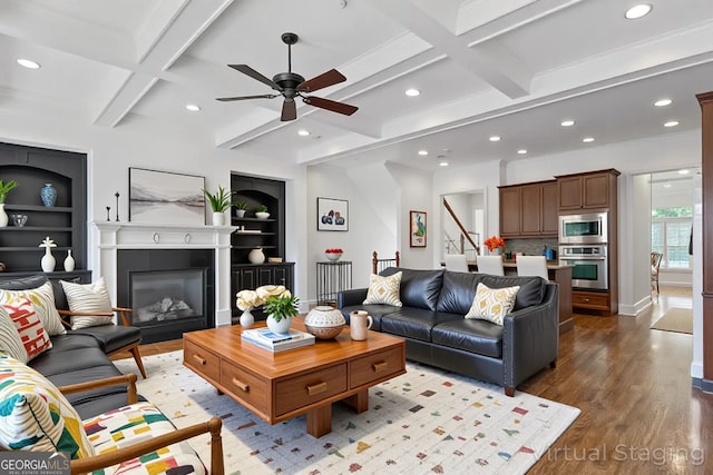 661 Lockton Pl # 9, Sandy Springs, GA 30342 - living room featuring recessed lighting, wood finished floors, a ceiling fan, coffered ceiling, and a glass covered fireplace