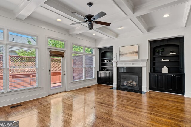 661 Lockton Pl # 9, Sandy Springs, GA 30342 - unfurnished living room featuring coffered ceiling, a ceiling fan, a tile fireplace, wood finished floors, and recessed lighting