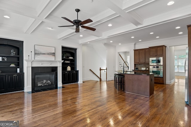 661 Lockton Pl # 9, Sandy Springs, GA 30342 - living area with dark wood-style flooring, recessed lighting, a ceiling fan, ornamental molding, and coffered ceiling