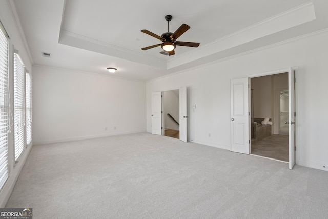 661 Lockton Pl # 9, Sandy Springs, GA 30342 - unfurnished bedroom with a tray ceiling, carpet, crown molding, baseboards, and ceiling fan