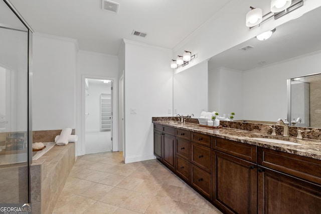 661 Lockton Pl # 9, Sandy Springs, GA 30342 - full bath featuring ornamental molding, double vanity, tile patterned floors, a shower stall, and tiled bath