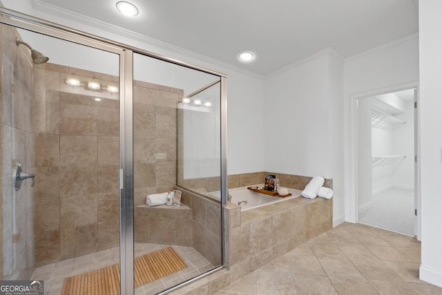 661 Lockton Pl # 9, Sandy Springs, GA 30342 - full bathroom featuring a bath, a stall shower, crown molding, a walk in closet, and tile patterned flooring