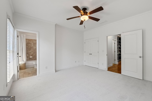 661 Lockton Pl # 9, Sandy Springs, GA 30342 - unfurnished bedroom with crown molding, carpet, baseboards, ensuite bath, and a ceiling fan
