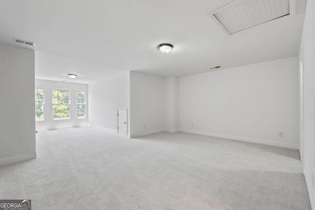 661 Lockton Pl # 9, Sandy Springs, GA 30342 - spare room with carpet flooring, baseboards, and attic access