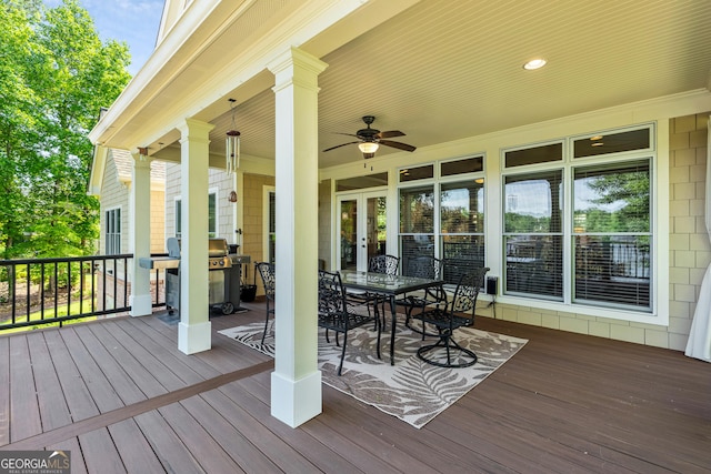 47 Lake Shore Dr, Newnan, GA 30265 - deck with outdoor dining area, a ceiling fan, grilling area, and french doors