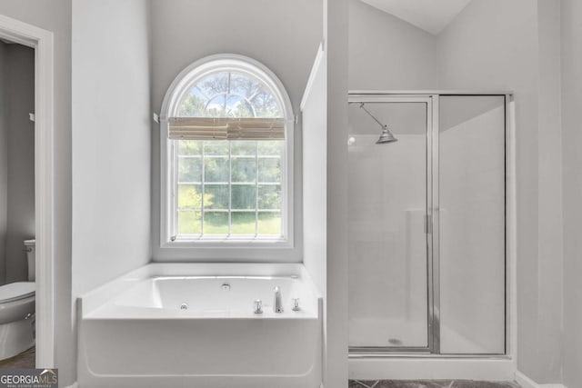 543 Serene Waters Trl, Jonesboro, GA 30236 - bathroom featuring toilet, a jetted tub, and a shower stall