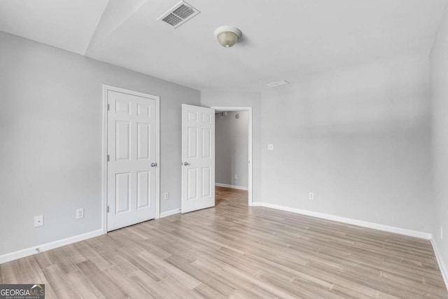 543 Serene Waters Trl, Jonesboro, GA 30236 - unfurnished bedroom featuring light wood-type flooring and baseboards