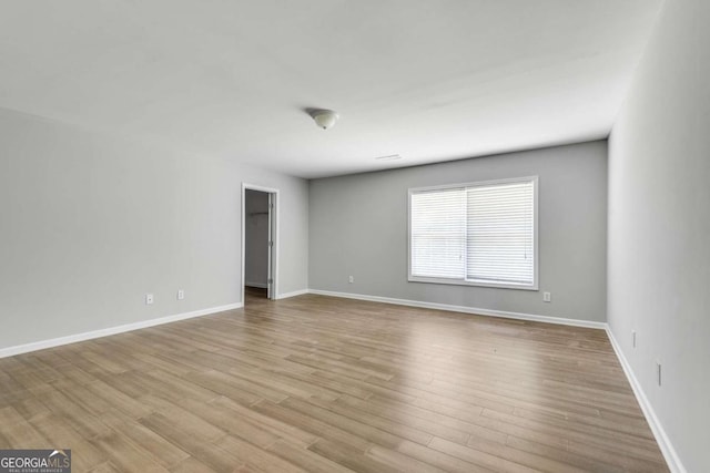 543 Serene Waters Trl, Jonesboro, GA 30236 - unfurnished room with wood finished floors and baseboards