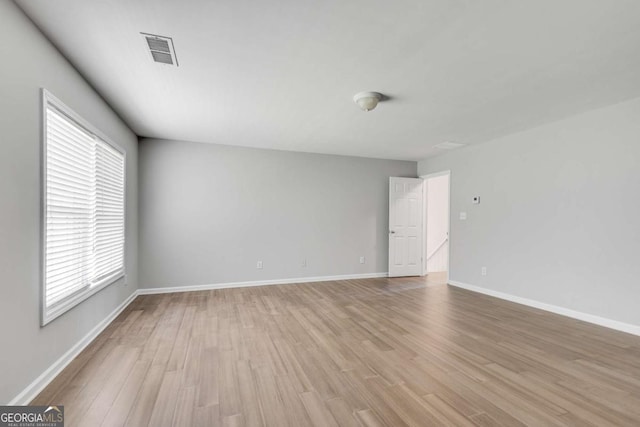 543 Serene Waters Trl, Jonesboro, GA 30236 - unfurnished room featuring light wood-style floors and baseboards